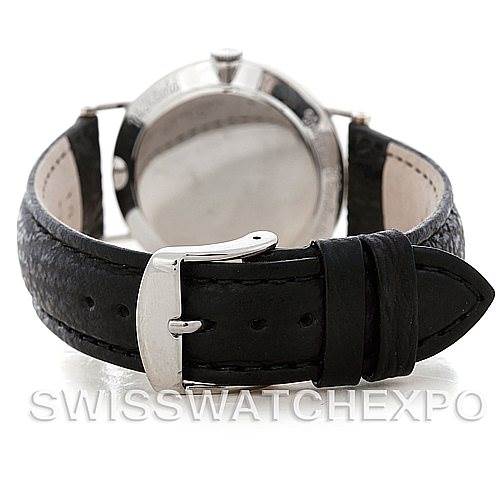 This image shows the back of a vintage Jaeger LeCoultre watch displaying its leather strap and buckle.