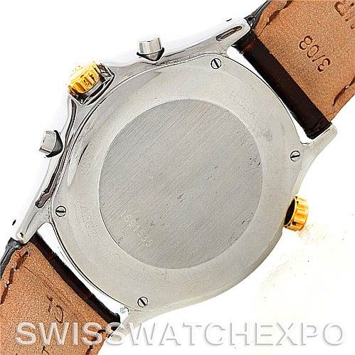 This image shows the back case and crown of a Vintage Jaeger LeCoultre watch from an angled bottom view.