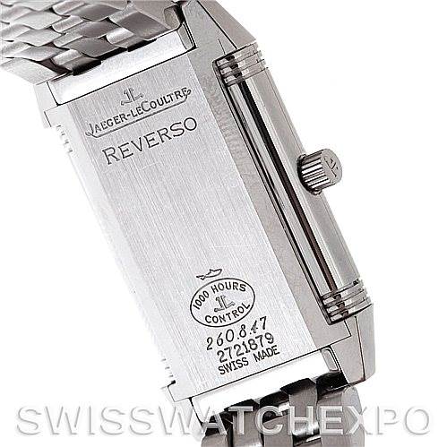 This image shows the back and side of a Jaeger LeCoultre Reverso 260.8.47 Women
s Stainless Steel Silver Dial 260.8.47 Women
s Stainless Steel Silver Dial watch, focusing on engraved details and the crown.