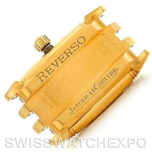 The image shows the caseback of a Jaeger-LeCoultre Reverso watch, highlighting the engravings and parts of the strap attachments.