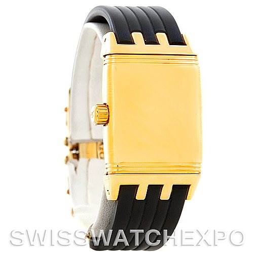 This image shows a side view of the Jaeger-LeCoultre Reverso watch, focusing on its gold case and the crown.