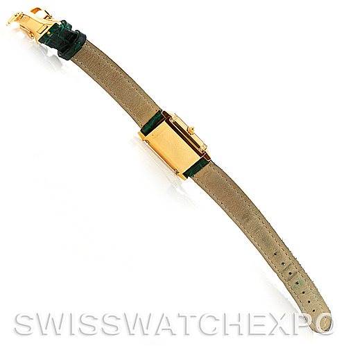 The image shows a Jaeger-LeCoultre Reverso model watch viewed from the back, featuring the full leather strap and clasp.