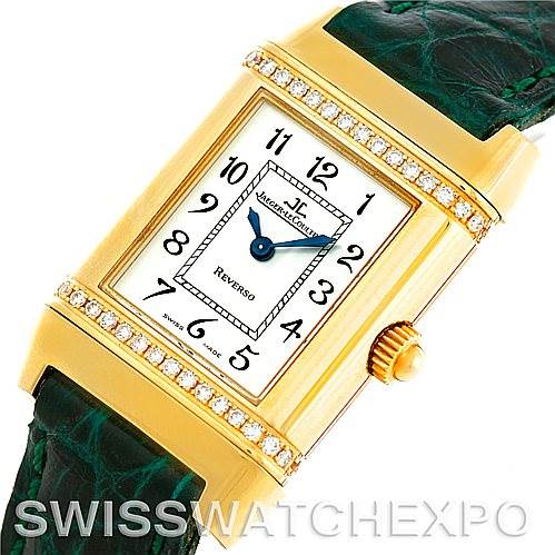 The image shows a close-up of the Jaeger LeCoultre Reverso 265108 Women's Yellow Gold Silver Dial 265108 Women's Yellow Gold Silver Dial watch, highlighting the dial, hands, crown, and part of the strap.