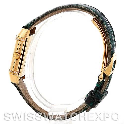 The image shows a side view of a Jaeger-LeCoultre Reverso model, highlighting the watch's crown, case side, and leather strap.