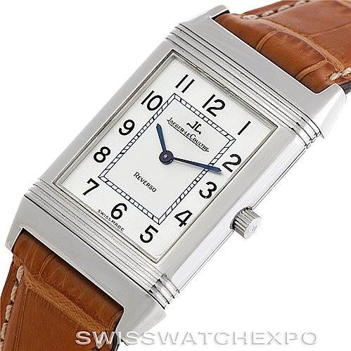 The image shows the front face and partial leather strap of a Jaeger-LeCoultre Reverso watch at a slight angle.