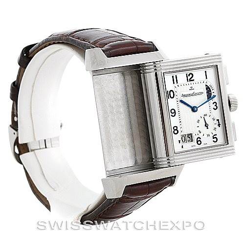 The image shows a Jaeger LeCoultre Reverso 240.8.18 Men's Stainless Steel Silver Dial 240.8.18 Men's Stainless Steel Silver Dial watch with the case flipped open, displaying its leather strap and inner mechanism.