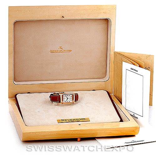 The image shows a Jaeger LeCoultre Reverso 270.2.64 Men's Rose Gold Silver Dial 270.2.64 Men's Rose Gold Silver Dial watch, presented in its open box along with accompanying documentation.