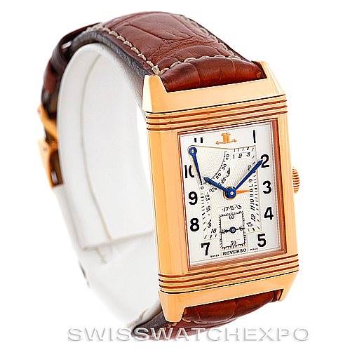 The watch is a Jaeger LeCoultre Reverso 270.2.64 Men's Rose Gold Silver Dial 270.2.64 Men's Rose Gold Silver Dial model shown at a front angle, highlighting its rectangular face and leather strap.