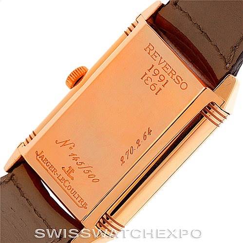 This image shows the case back of a Jaeger LeCoultre Reverso 270.2.64 Men's Rose Gold Silver Dial 270.2.64 Men's Rose Gold Silver Dial watch, highlighting its engravings and brown leather strap.