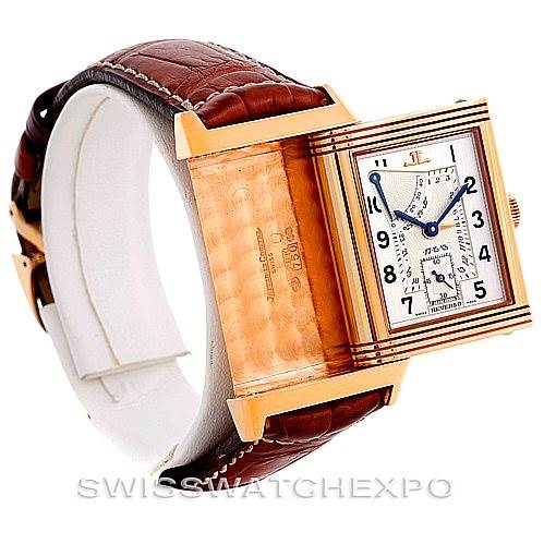 This image shows the Jaeger-LeCoultre Reverso model watch at an angle highlighting its reversible case and partially visible brown leather strap.