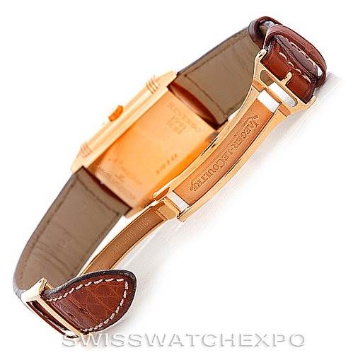The image shows the clasp and underside of a Jaeger LeCoultre Reverso 270.2.64 Men's Rose Gold Silver Dial 270.2.64 Men's Rose Gold Silver Dial watch, highlighting the brown leather strap and rose gold buckle.