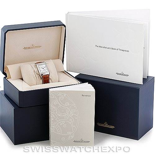 The image shows a Jaeger LeCoultre Reverso 270.8.36 Men's Stainless Steel Silver Dial 270.8.36 Men's Stainless Steel Silver Dial watch in its box, accompanied by user manuals and booklets.