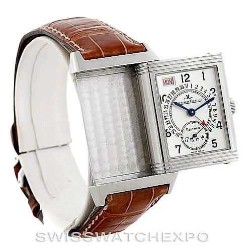 The image shows a Jaeger LeCoultre Reverso 270.8.36 Men's Stainless Steel Silver Dial 270.8.36 Men's Stainless Steel Silver Dial watch in a side-angle view, highlighting its swiveling case mechanism and leather strap.
