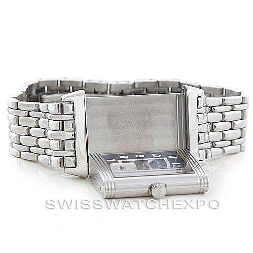 The image shows the Jaeger LeCoultre Reverso 250.8.71 Stainless Steel Blue Dial 250.8.71 Stainless Steel Blue Dial watch partially flipped, highlighting its reversible case and bracelet.