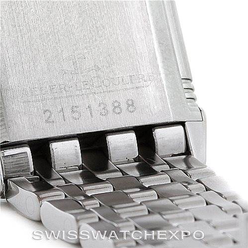 This image shows a close-up of the back case and metal bracelet of the Jaeger-LeCoultre Reverso watch.