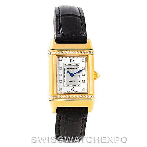 This is a front view of the Jaeger LeCoultre Reverso 265.1.08 Women's Yellow Gold Mother of Pearl Dial 265.1.08 Women's Yellow Gold Mother of Pearl Dial watch, showing its dial, case, crown, and leather strap.