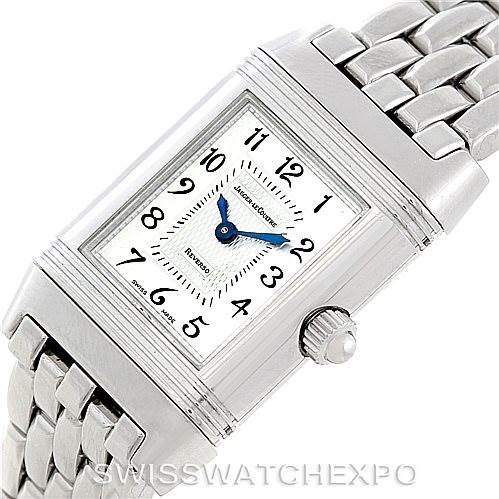 The image shows a top view of the Jaeger LeCoultre Reverso 266.8.44 Women's Stainless Steel Mother of Pearl Dial 266.8.44 Women's Stainless Steel Mother of Pearl Dial watch, highlighting its dial, crown, and metal bracelet.