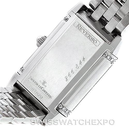 The image shows the back and side view of a Jaeger-LeCoultre Reverso watch, highlighting the caseback, crown, and metal bracelet.