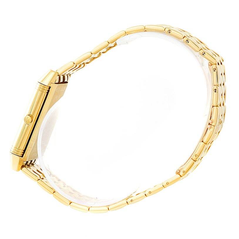 The image shows a side view of the Jaeger LeCoultre Reverso 250.1.86 Men
s Yellow Gold Silver Dial 250.1.86 Men
s Yellow Gold Silver Dial watch, highlighting the case and part of the gold bracelet.