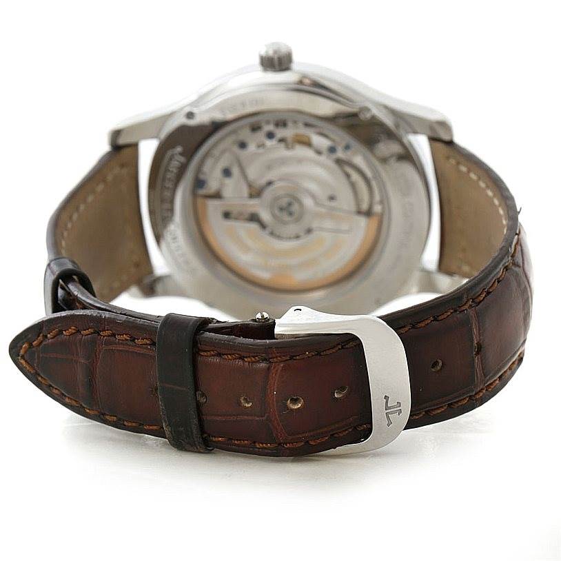 The image shows the back view of the Jaeger LeCoultre Master 147.8.37.S Men's Stainless Steel Silver Dial 147.8.37.S Men's Stainless Steel Silver Dial model watch, highlighting its movement and leather strap with buckle.