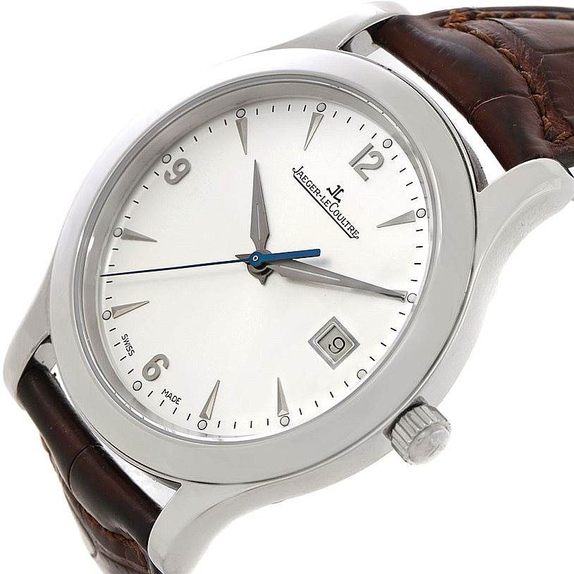 The Jaeger LeCoultre Master 147.8.37.S Men's Stainless Steel Silver Dial 147.8.37.S Men's Stainless Steel Silver Dial watch is shown at an angled view highlighting its dial, crown, and leather strap.