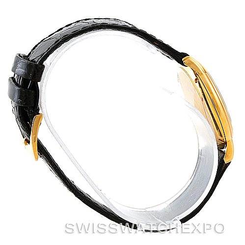 This image shows a side view of a Jaeger LeCoultre Vintage 162.7.81 Men's Yellow Gold White Dial 162.7.81 Men's Yellow Gold White Dial watch, highlighting the strap, buckle, and watch case.