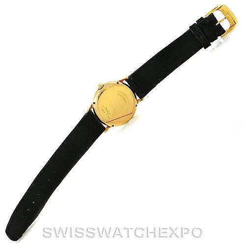 This image shows the back view of a Jaeger LeCoultre Vintage 162.7.81 Men's Yellow Gold White Dial 162.7.81 Men's Yellow Gold White Dial watch, highlighting the closed caseback and black leather strap.