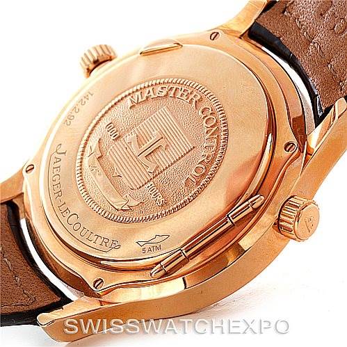 The image shows the back of a Jaeger LeCoultre Master 142.2.92 Men's Rose Gold Silver Dial 142.2.92 Men's Rose Gold Silver Dial model watch, highlighting the case back, crown, and part of the leather strap.