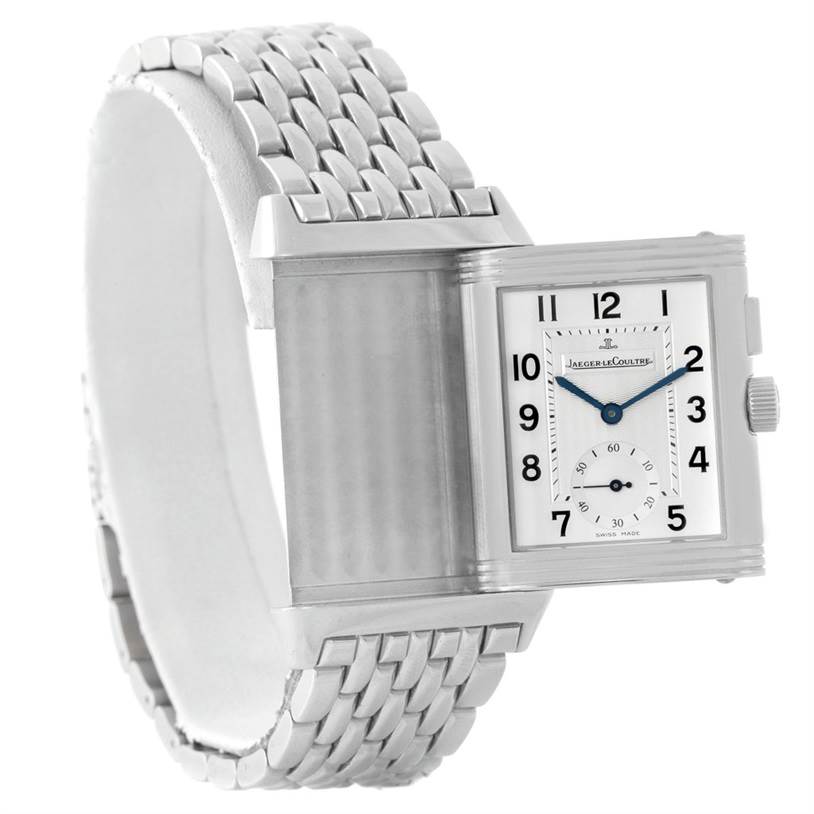 The watch, a Jaeger LeCoultre Reverso 272.8.54 Stainless Steel Silver Dial 272.8.54 Stainless Steel Silver Dial model, is shown at an angle highlighting the face, crown, and part of the metal bracelet.