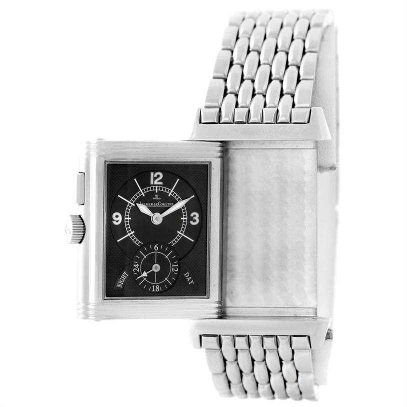 The image shows a Jaeger-LeCoultre Reverso watch in a slightly angled side view, highlighting the face and the attached metal bracelet.