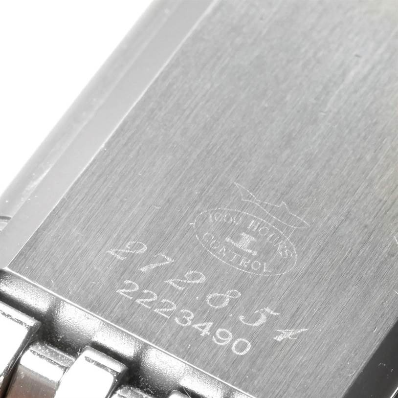 This image shows a close-up of the clasp and engraved serial number on the Jaeger-LeCoultre Reverso watch.