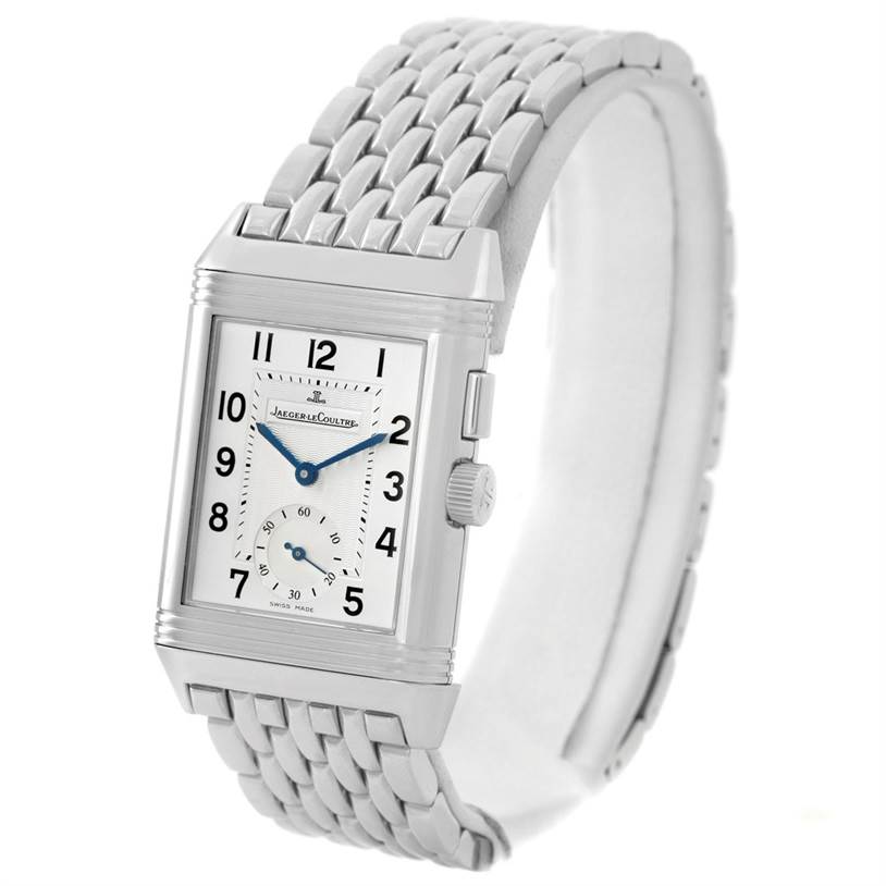 The image shows a Jaeger LeCoultre Reverso 272.8.54 Stainless Steel Silver Dial 272.8.54 Stainless Steel Silver Dial watch viewed from an angle that highlights its rectangular face and metal bracelet.