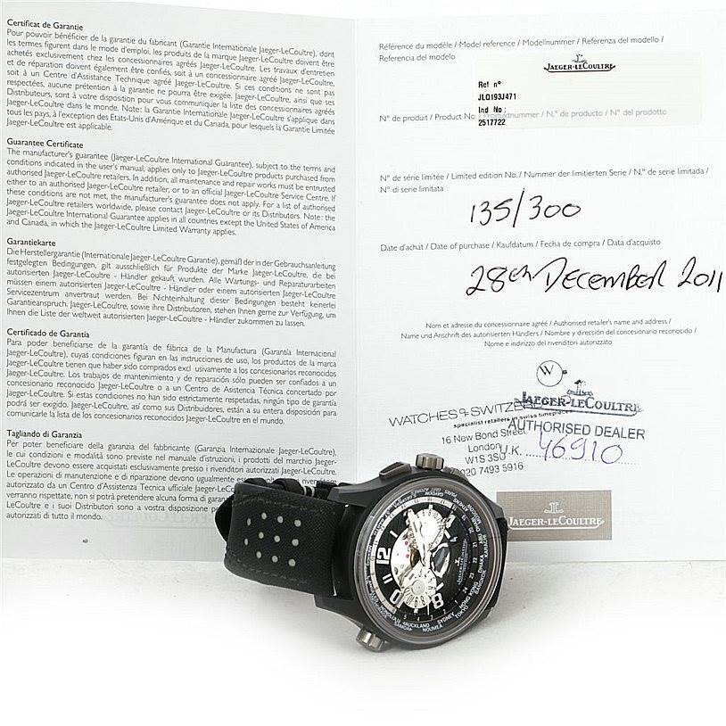 The image shows a Jaeger-LeCoultre Amvox watch positioned at a slight angle with accompanying warranty documentation.
