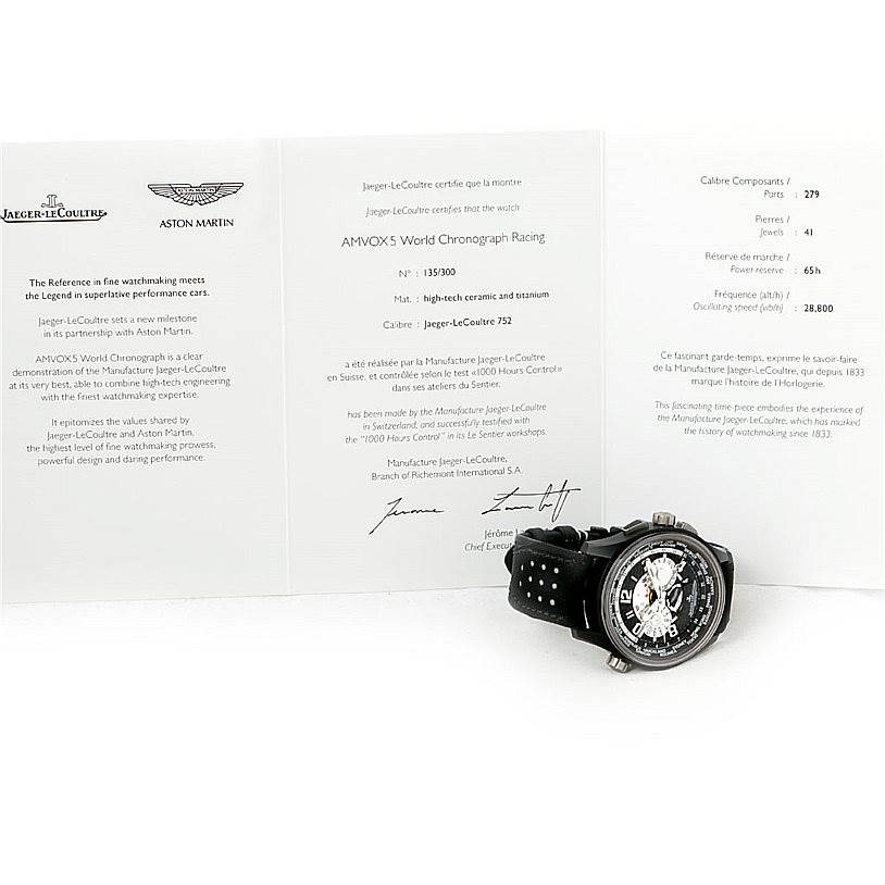 The image shows the Jaeger-LeCoultre Amvox watch at an oblique angle alongside its certification papers.