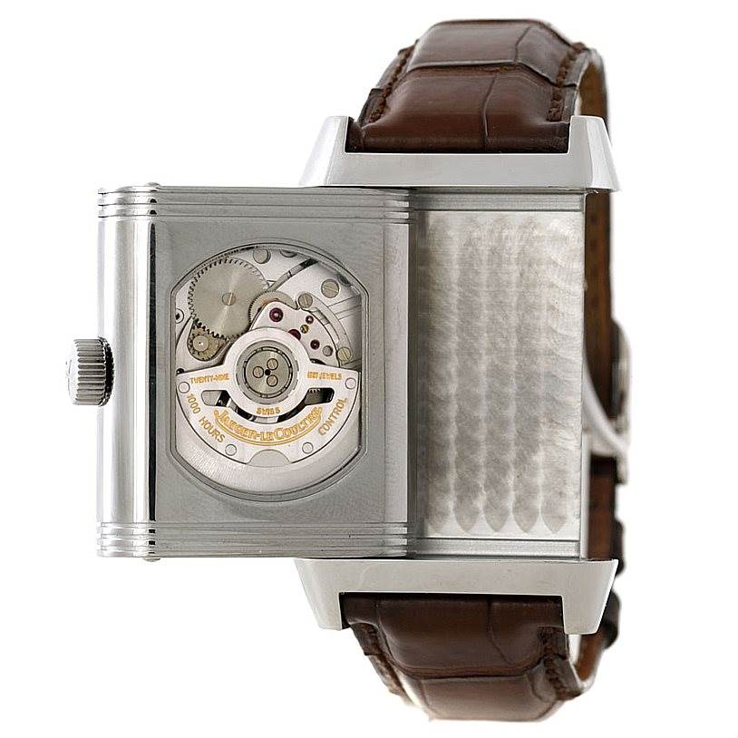 This image shows a side view of the Jaeger LeCoultre Reverso 240.8.72 Men's Stainless Steel Silver Dial 240.8.72 Men's Stainless Steel Silver Dial watch with its case swiveled to display the movement.