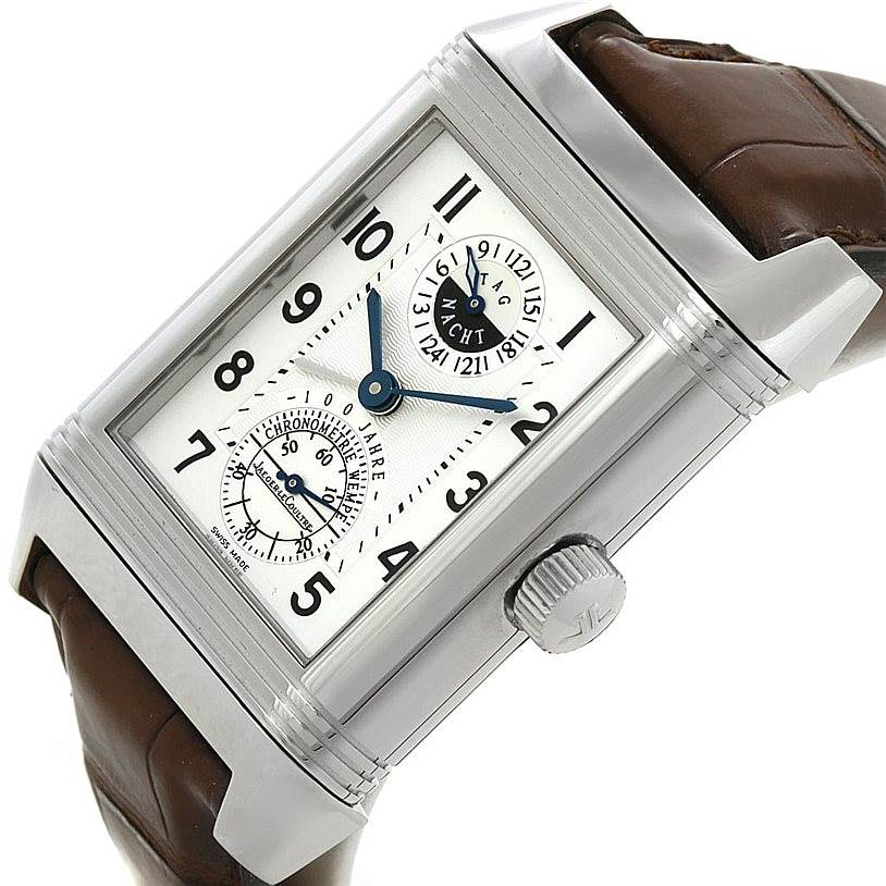 The Jaeger LeCoultre Reverso 240.8.72 Men's Stainless Steel Silver Dial 240.8.72 Men's Stainless Steel Silver Dial watch is shown at an oblique angle, highlighting the dial, crown, and leather strap.