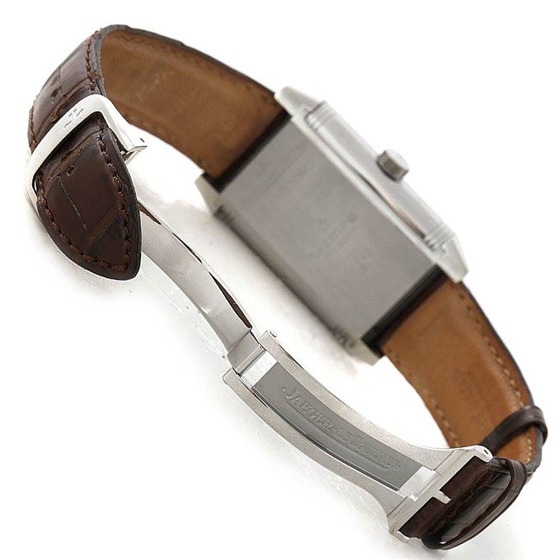 The image shows the back and side of a Jaeger LeCoultre Reverso 240.8.72 Men's Stainless Steel Silver Dial 240.8.72 Men's Stainless Steel Silver Dial watch, including the brown leather strap and metal clasp.
