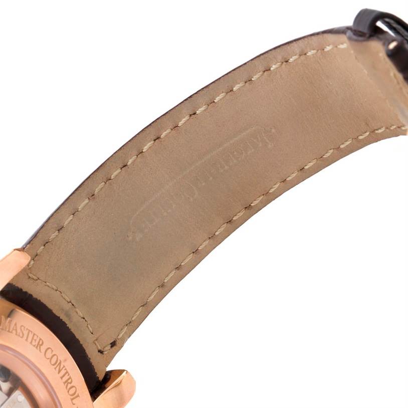 This image shows the underside of the leather strap and part of the case back of a Jaeger-LeCoultre Master Control watch.