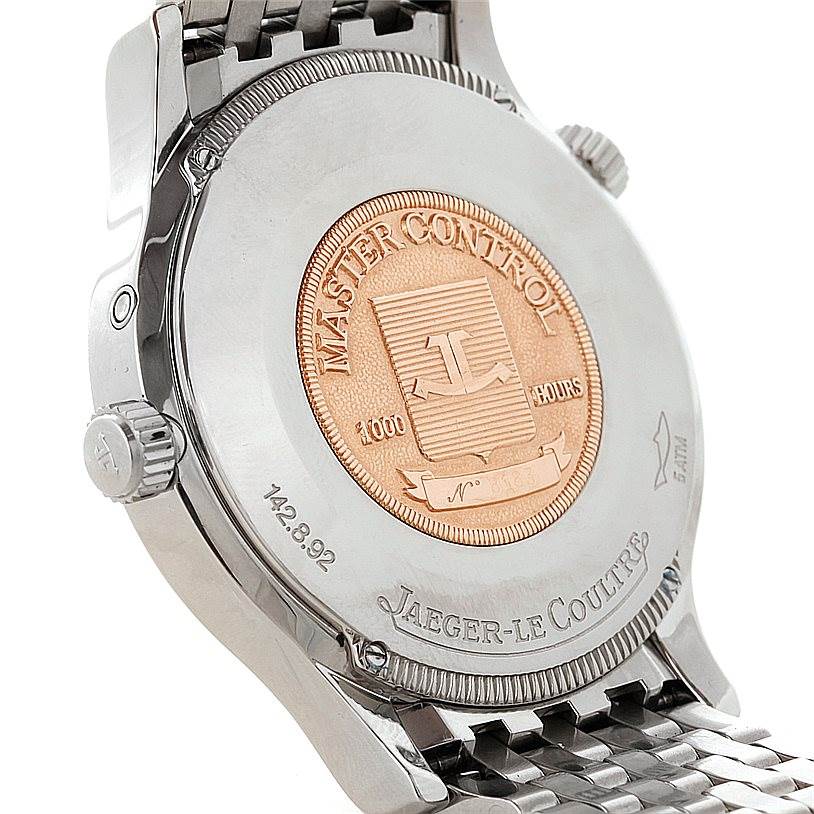 The image shows the case back and part of the bracelet of the Jaeger LeCoultre Master 142.8.92 Men's Stainless Steel Silver Dial 142.8.92 Men's Stainless Steel Silver Dial model watch.