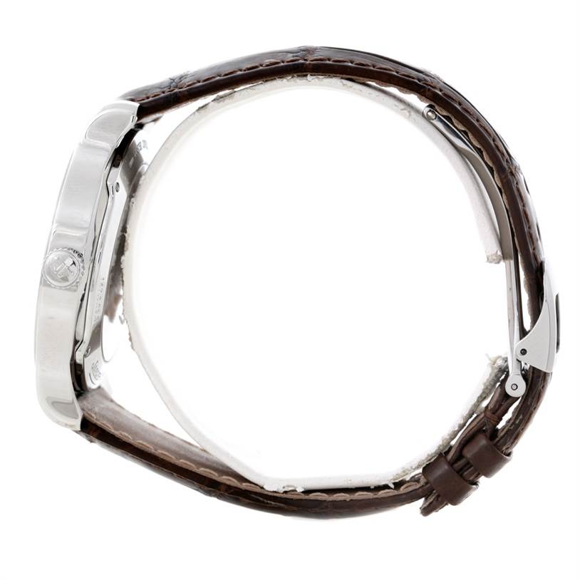 The image shows a side view of a Jaeger LeCoultre Master 147.8.05.S Men's Stainless Steel Silver Dial 147.8.05.S Men's Stainless Steel Silver Dial watch, highlighting its crown and brown leather strap.