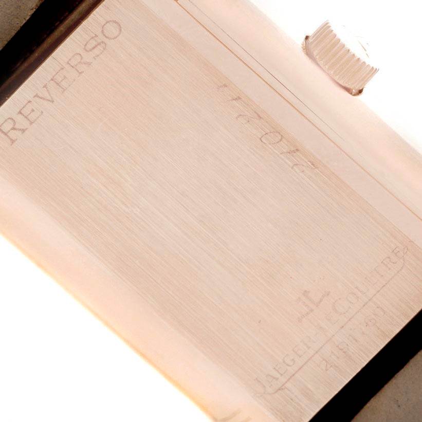 This image shows a close-up of the side and crown of a Jaeger LeCoultre Reverso Q3012420 Men's Rose Gold Silver Dial Q3012420 Men's Rose Gold Silver Dial watch.