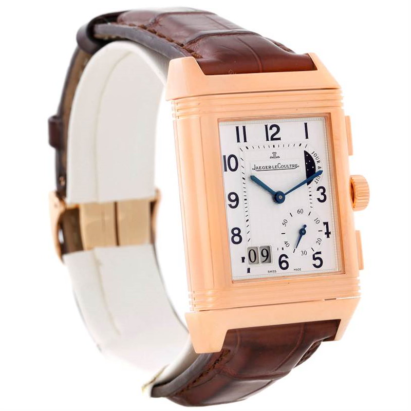 This image shows a Jaeger-LeCoultre Reverso watch from a front-left angle with a brown leather strap and rose gold casing.