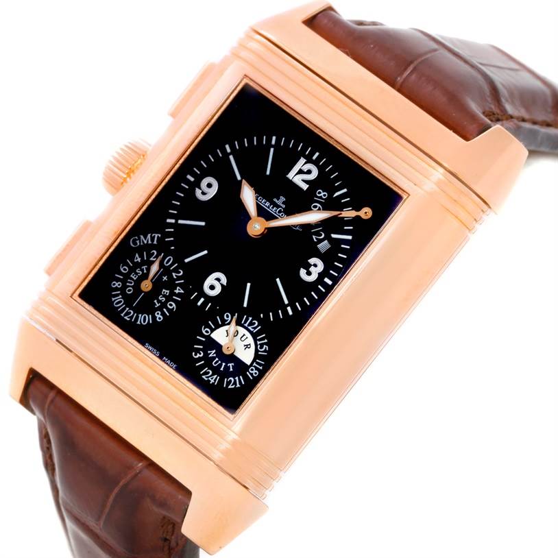 This Jaeger LeCoultre Reverso 240.2.18 Men
s Rose Gold Silver Dial 240.2.18 Men
s Rose Gold Silver Dial watch is shown from a high angle, displaying its dial, case, crown, and strap.