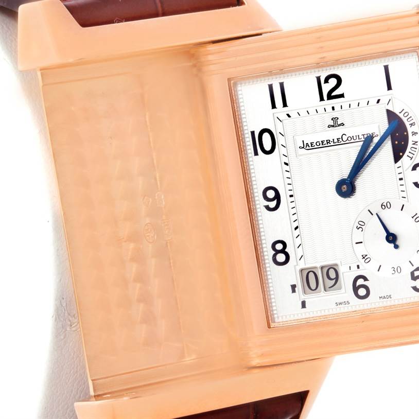 This close-up image displays the watch face, case, and part of the strap of the Jaeger-LeCoultre Reverso model.