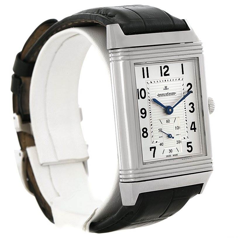 This image shows a Jaeger LeCoultre Reverso 273.8.04 Men's Stainless Steel Silver Dial 273.8.04 Men's Stainless Steel Silver Dial watch at a slight angle, highlighting its face, case, lugs, and leather strap.