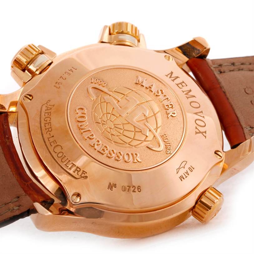 The image shows the case back and crown of the Jaeger-LeCoultre Master Compressor Memovox watch.