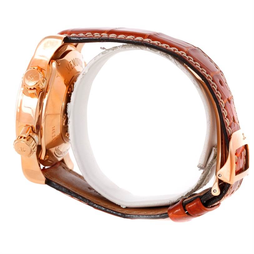 This image shows the side view of a Jaeger LeCoultre Master Q1702440 Men's Rose Gold Black Dial Q1702440 Men's Rose Gold Black Dial model watch, highlighting its crown, pushers, and brown leather strap with buckle.