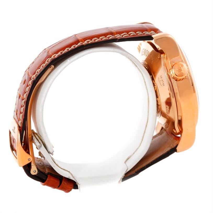 This image shows the side angle of a Jaeger LeCoultre Master Q1702440 Men's Rose Gold Black Dial Q1702440 Men's Rose Gold Black Dial model watch, focusing on its brown leather strap and gold case.