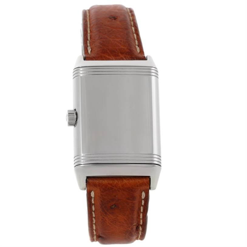 This image shows a front view of the Reverso model by Jaeger LeCoultre, featuring its rectangular case and brown leather strap.