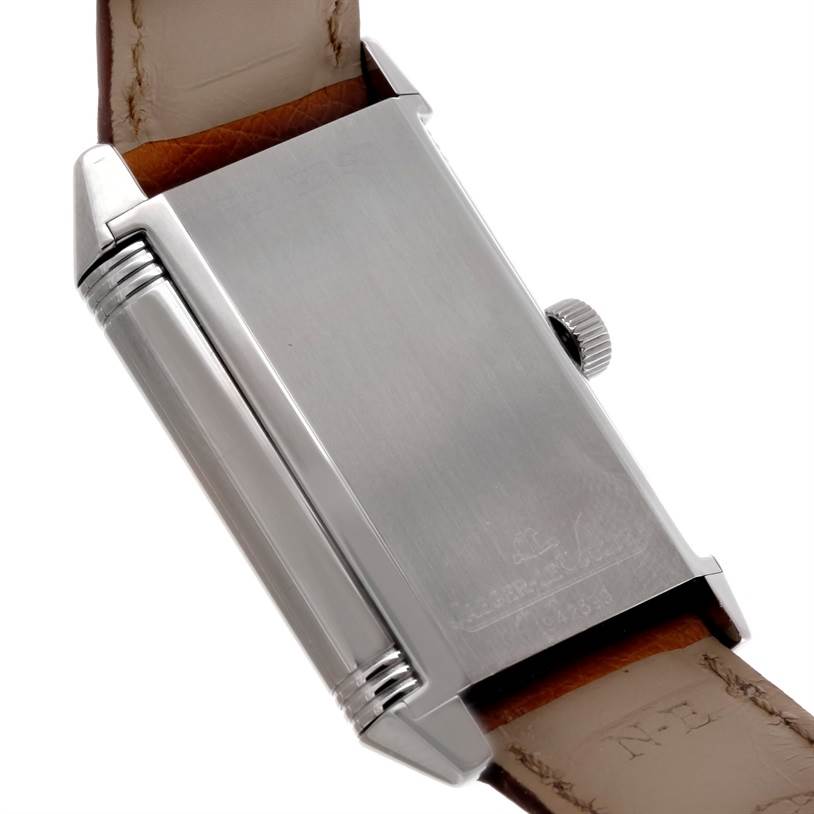 The image shows the back and side view of a Jaeger-LeCoultre Reverso watch, highlighting the case and leather strap.
